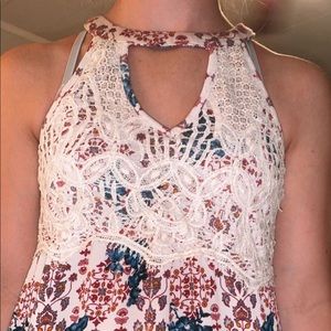 Super cute top! Open in front and back